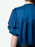 Taste Satin Top - Blue satin V-neck top with short gathered sleeves and pleated details.