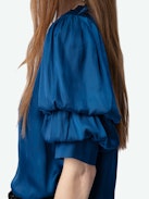 Taste Satin Top - Blue satin V-neck top with short gathered sleeves and pleated details.
