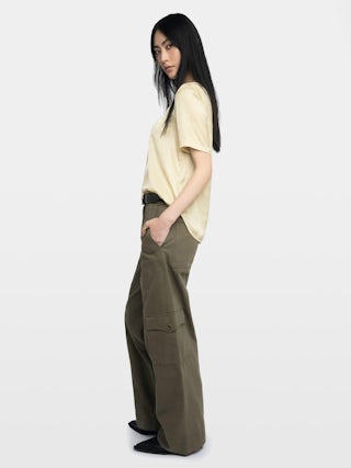 Terzo Satin Top - Top in Japanese satin, laced neckline with metallic wings and short sleeves.