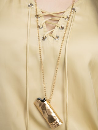 Top Terzo Satin - Top en satin japonais, décolleté lacé avec wings métalliques et manches courtes.