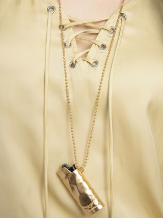 Terzo Satin Top - Top in Japanese satin, laced neckline with metallic wings and short sleeves.