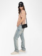 Terzo Top - Printed viscose top with laced neckline, metal wings and short sleeves.
