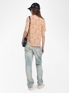 Terzo Top - Printed viscose top with laced neckline, metal wings and short sleeves.