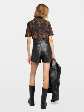Top Terzo 100% Seda - Top de seda estampada, escote en V con cordones y wings metálicas, mangas cortas.