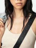 Astra Dress - A sleek tank dress that embodies the brand's signature edgy elegance. This white dress features distinctive wing-shaped embellishments on the front, adding a unique flair to its minimalist design. The Astra Dress is a versatile addition to any wardrobe, seamlessly transitioning from day to night with effortless style.