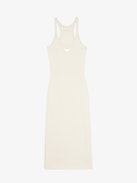 Astra Dress - A sleek tank dress that embodies the brand's signature edgy elegance. This white dress features distinctive wing-shaped embellishments on the front, adding a unique flair to its minimalist design. The Astra Dress is a versatile addition to any wardrobe, seamlessly transitioning from day to night with effortless style.