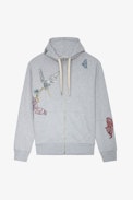 Sudadera con strass Harper - Sudadera de algodón con capucha y cremallera de color gris jaspeado con motivo Holly en strass para mujer.