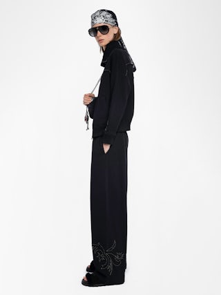 Milly Zip Up Sweatshirt - Women's black zip up sweatshirt with western inspired studded details on back.