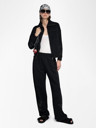 Milly Zip Up Sweatshirt - Women's black zip up sweatshirt with western inspired studded details on back.