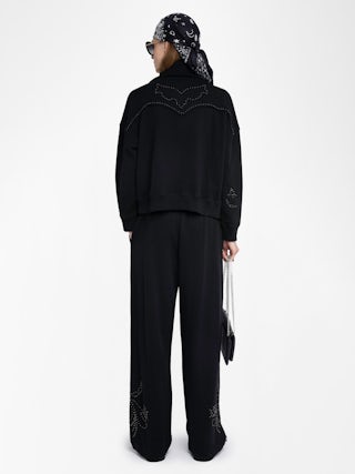 Milly Zip Up Sweatshirt - Women's black zip up sweatshirt with western inspired studded details on back.