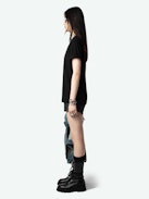 Edwin T-shirt - Women's black t-shirt with pink ghost print on front.