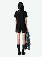 Edwin T-shirt - Women's black t-shirt with pink ghost print on front.