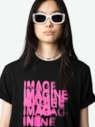 Edwin T-shirt - Women's black t-shirt with pink ghost print on front.
