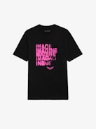 Edwin T-shirt - Women's black t-shirt with pink ghost print on front.