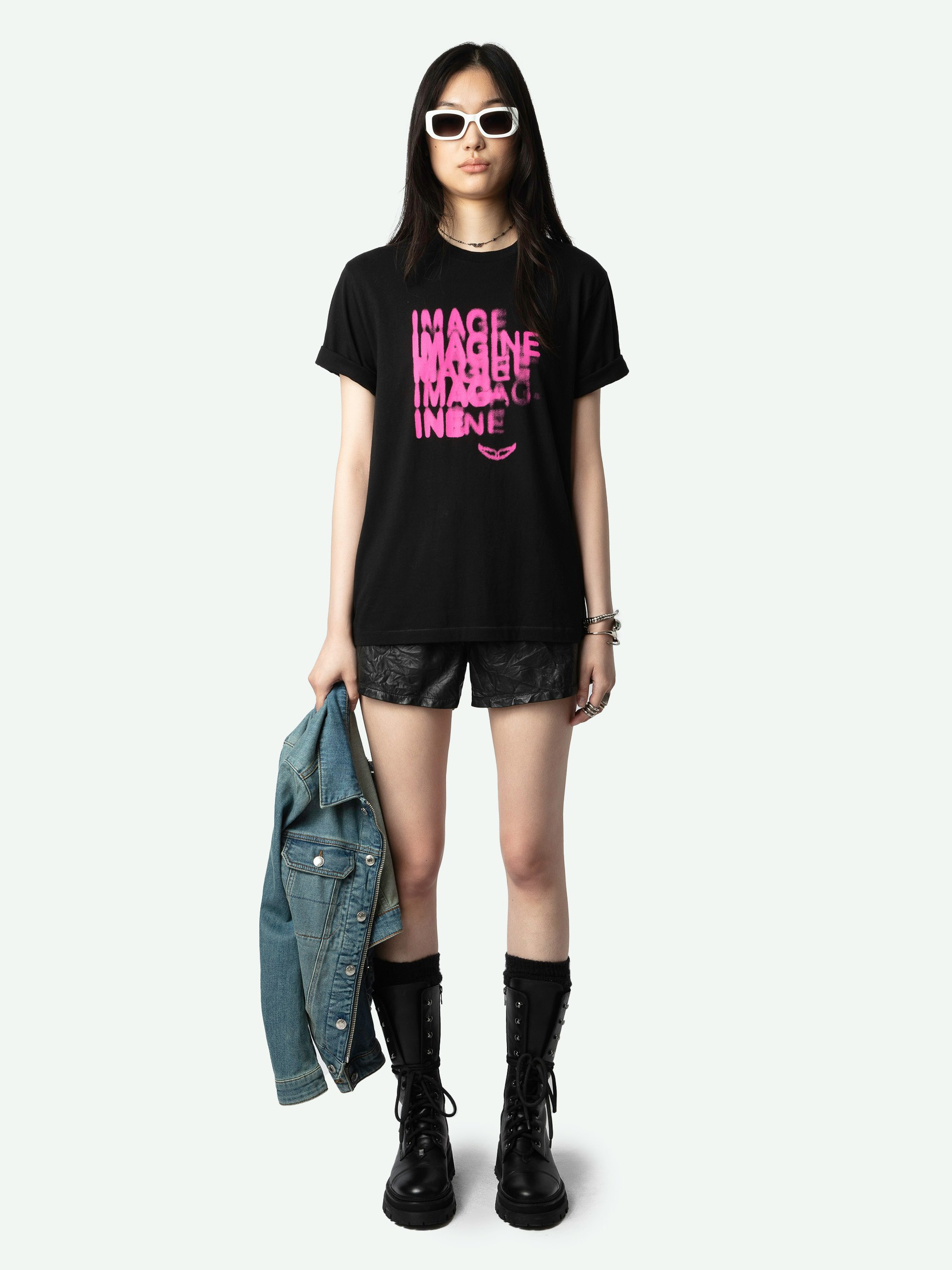 Edwin T-shirt - Women's black t-shirt with pink ghost print on front.