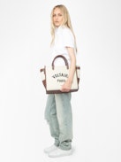 Mirta Polo - Short-sleeved cropped polo with embroidered wings on the front.