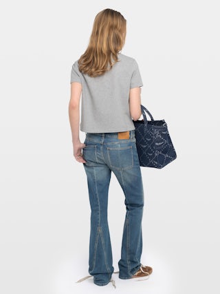 Polo Mirta - Polo manches courtes avec ailes brodées à l'avant.