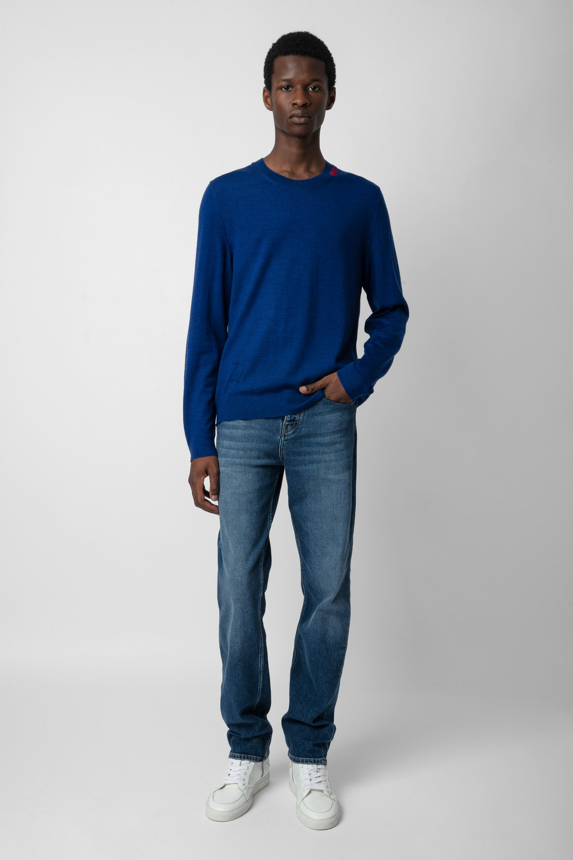 Kennedy Jumper - Men’s blue merino wool jumper with “Art Is Truth” embroidery on the neckline.