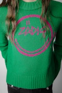 Pullover Lanna - Grüner Damenpullover aus Merinowolle mit rosafarbenen „Happy Face“-Maximotiv