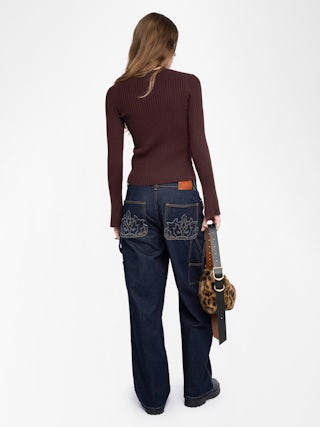 Lyana Sweater - Merino wool top with shirt collar, long sleeves, diamanté jewel buttons and wings on the back.