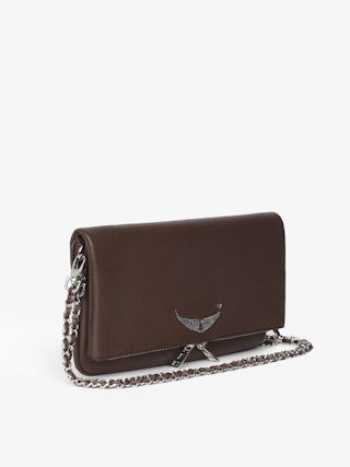 Rock Clutch - Grained leather clutch with double leather and metal chains and rhinestone-embellished wings.