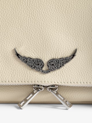 Rock Clutch - Clutch in grained leather with double leather and metal chains and wings adorned with rhinestones.