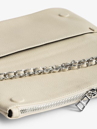 Rock Clutch - Clutch in grained leather with double leather and metal chains and wings adorned with rhinestones.