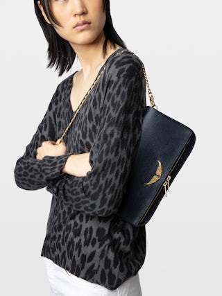 Rock Clutch - Grained leather clutch with double leather and metal chains and rhinestone-adorned wings.