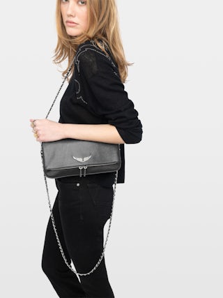 Rock Clutch - Grained leather clutch with double leather and metal chains and rhinestone-adorned wings.