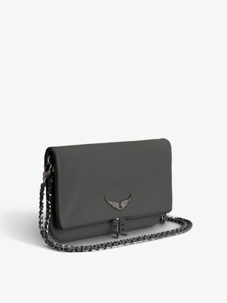 Rock Clutch - Grained leather clutch with double leather and metal chains and wings adorned with rhinestones.