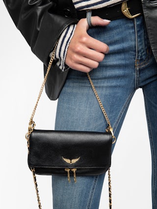 Rock Nano Clutch - Grained leather clutch with double leather and metal chains and rhinestone-adorned wings.