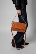 Rock Novel Bag - Women's small leather clutch with flap and shoulder strap in camel