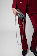 Rock Nano Clutch - Women’s Rock Nano clutch in black quilted leather with topstitched motifs