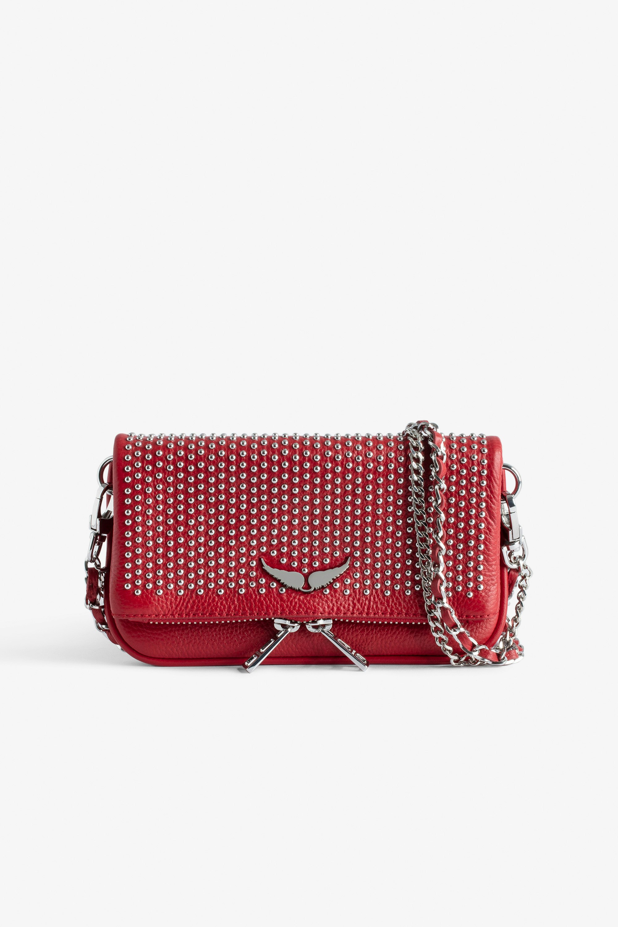 Rock Nano Dotted Swiss Clutch - Women’s small red grained leather clutch with dotted Swiss studs, chains and wings.