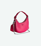 Moonrock Bag - Women’s half-moon bag in pink grained leather with a short handle, shoulder strap, chain and signature wings.