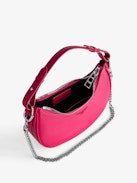Moonrock Bag - Women’s half-moon bag in pink grained leather with a short handle, shoulder strap, chain and signature wings.