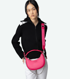 Moonrock Bag - Women’s half-moon bag in pink grained leather with a short handle, shoulder strap, chain and signature wings.