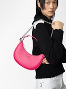 Moonrock Bag - Women’s half-moon bag in pink grained leather with a short handle, shoulder strap, chain and signature wings.