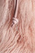 Rock To Go Frenzy Shearling Bag - Women’s small bucket bag in pink shearling leather with drawstring and shoulder strap.