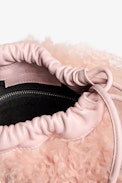 Rock To Go Frenzy Shearling Bag - Women’s small bucket bag in pink shearling leather with drawstring and shoulder strap.
