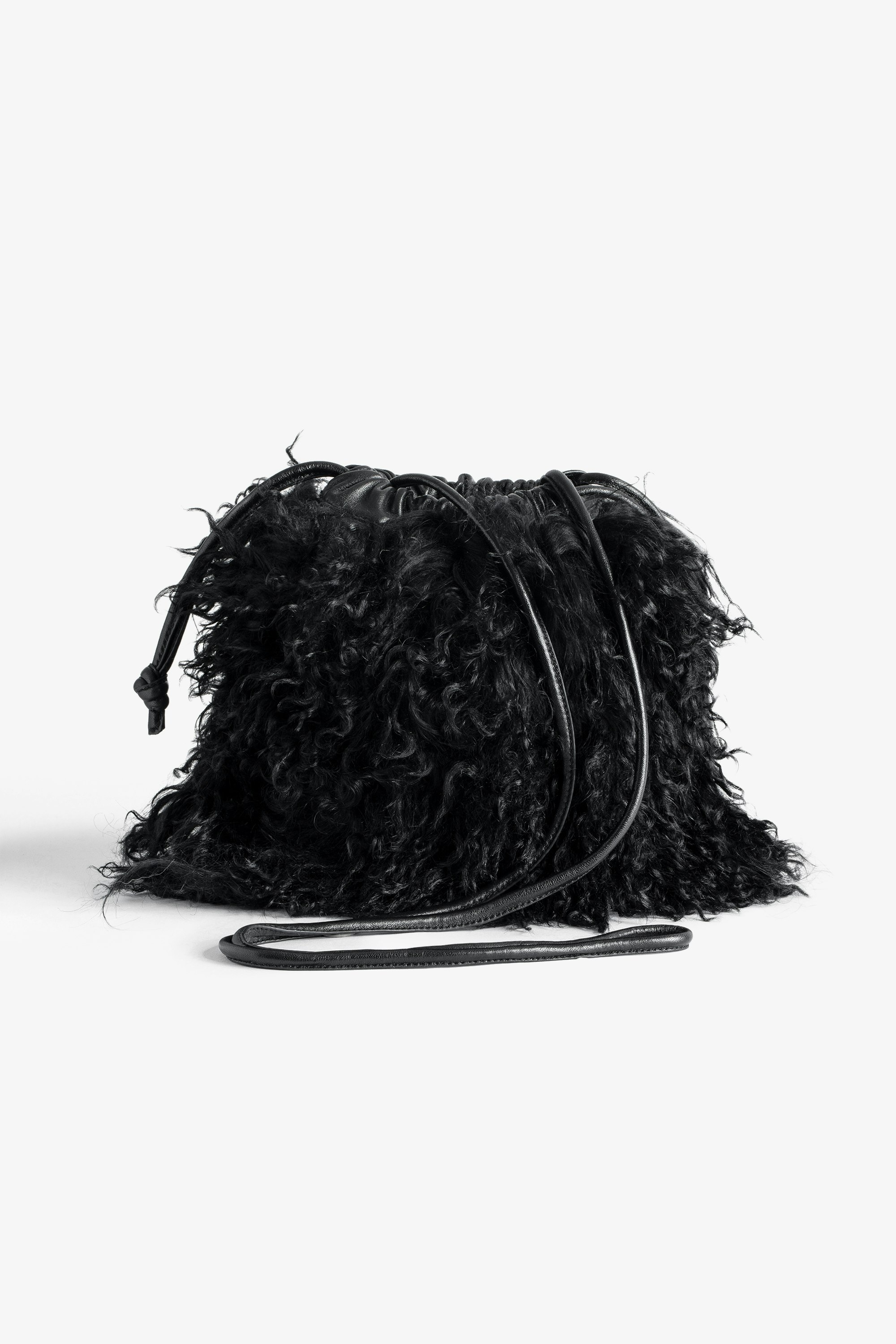 Rock To Go Frenzy Shearling Bag Women’s small bucket bag in black shearling with drawstring and shoulder strap.