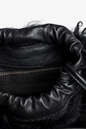 Rock To Go Frenzy Shearling Bag - Women’s small bucket bag in black shearling with drawstring and shoulder strap.