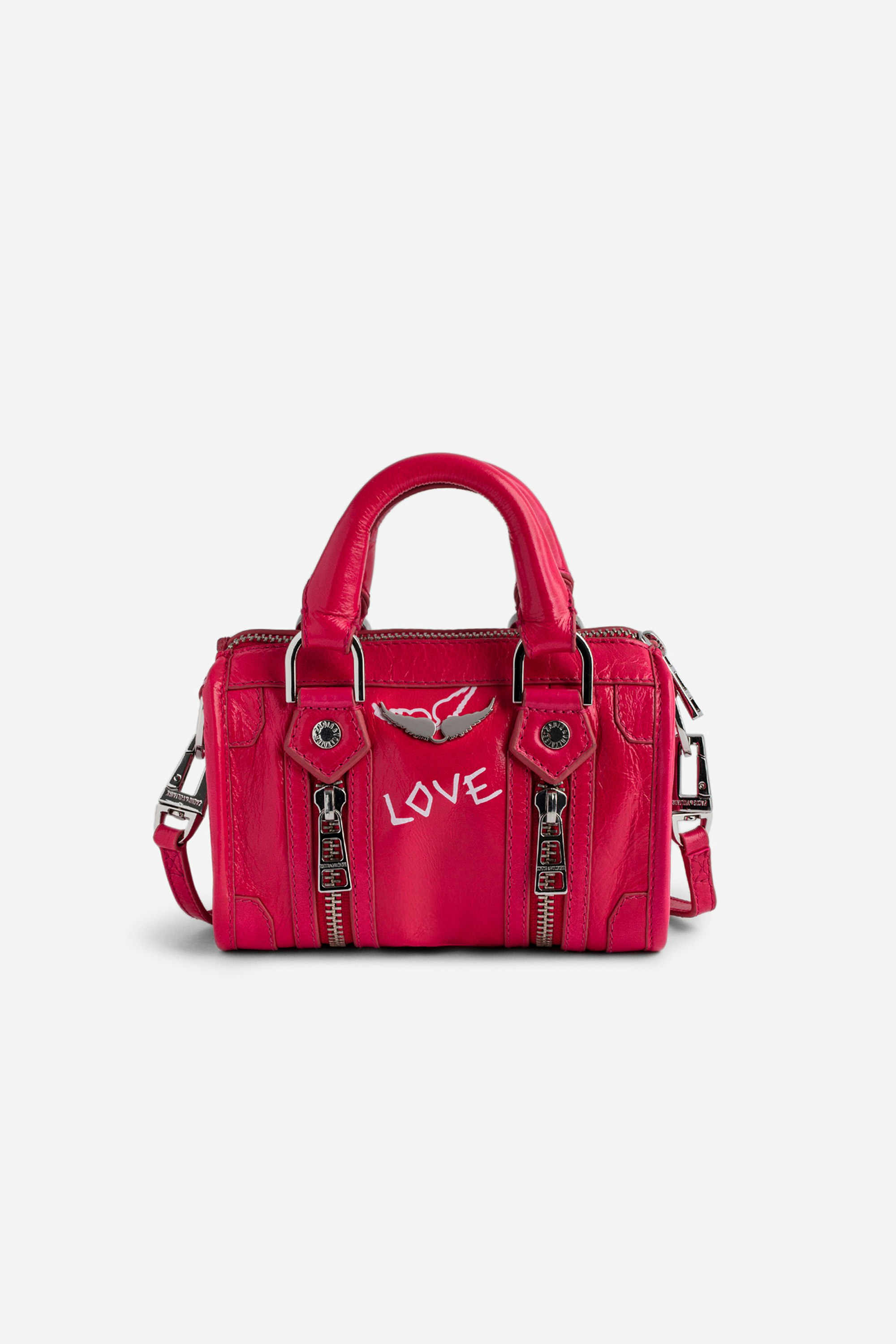 Tasche Sunny Nano #2 Tag - Nano-Tasche aus rosafarbenem Lackleder mit Vintage-Optik mit Henkeln und Schulterriemen mit Flügel- und „Love“-Tags.