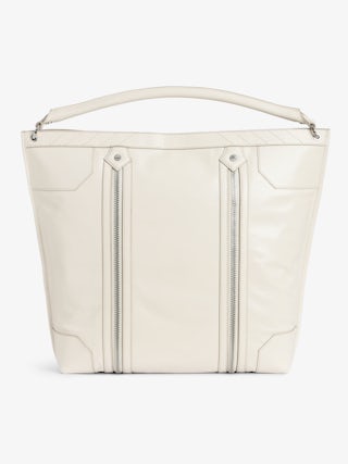 Sunny Hobo Bag - Vintage-effect patent leather hobo bag with handle and signature wings.