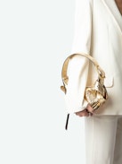 Le Cecilia XS Bag - Small metallic gold leather bag with crinkle effect, shoulder strap and metal C buckle.