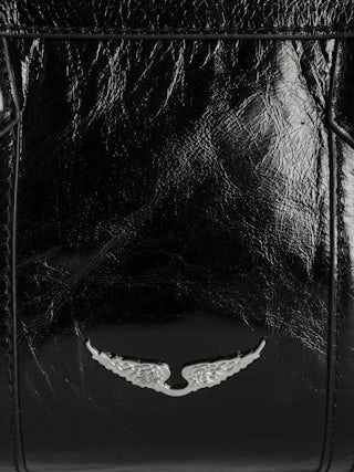 Sac Sunny Mood Vintage Patent - Sac en cuir vernis effet vintage à charm médaillon et signatures ailes.