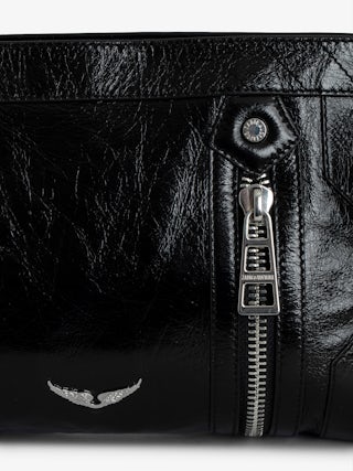 Sunny Moody Vintage Patent Bag - Vintage patent leather bag with adjustable shoulder strap and wing signature.