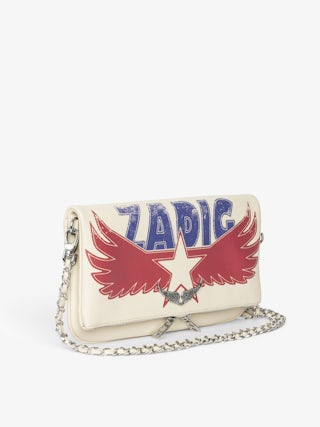 Rock Clutch - Grained leather pochette with double leather and metal chain and rhinestone-embellished wings.