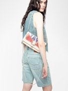 Pochette Rock - Pochette aus genarbtem Leder mit doppelter Kette aus Leder und Metall und mit Strass verzierten Flügeln.