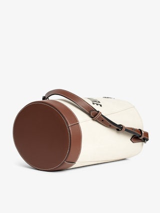Z Bucket Voltaire Bag - Canvas and grained leather bucket bag with adjustable strap and wing signature.